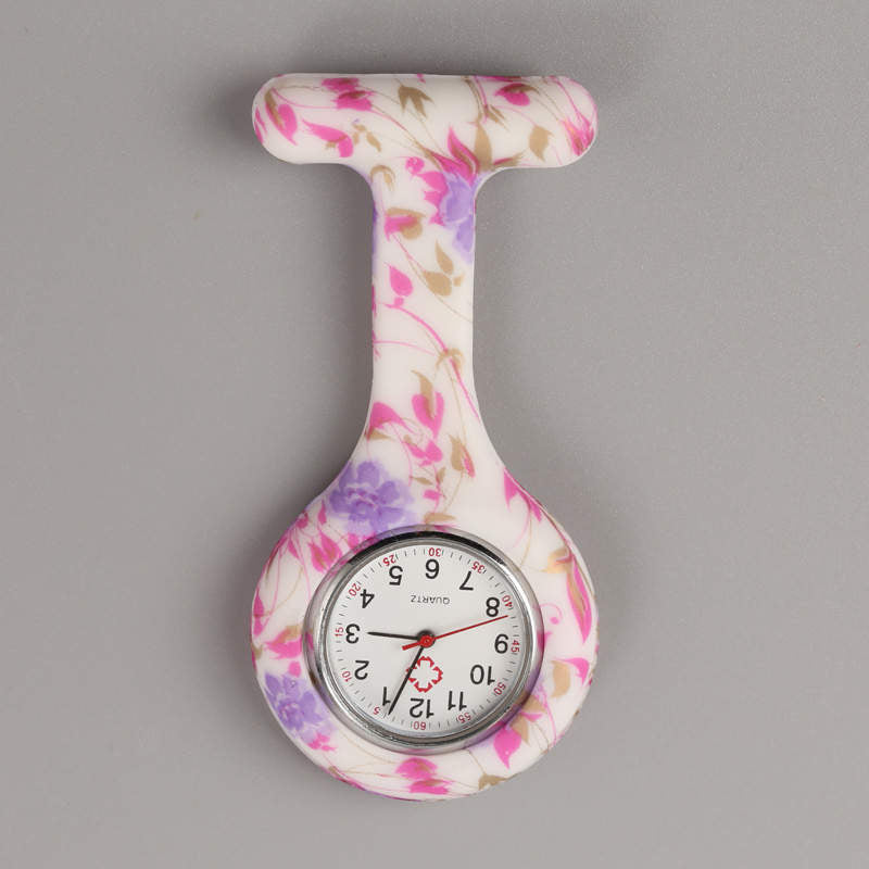 Reloj prendedor blanco flores rosa